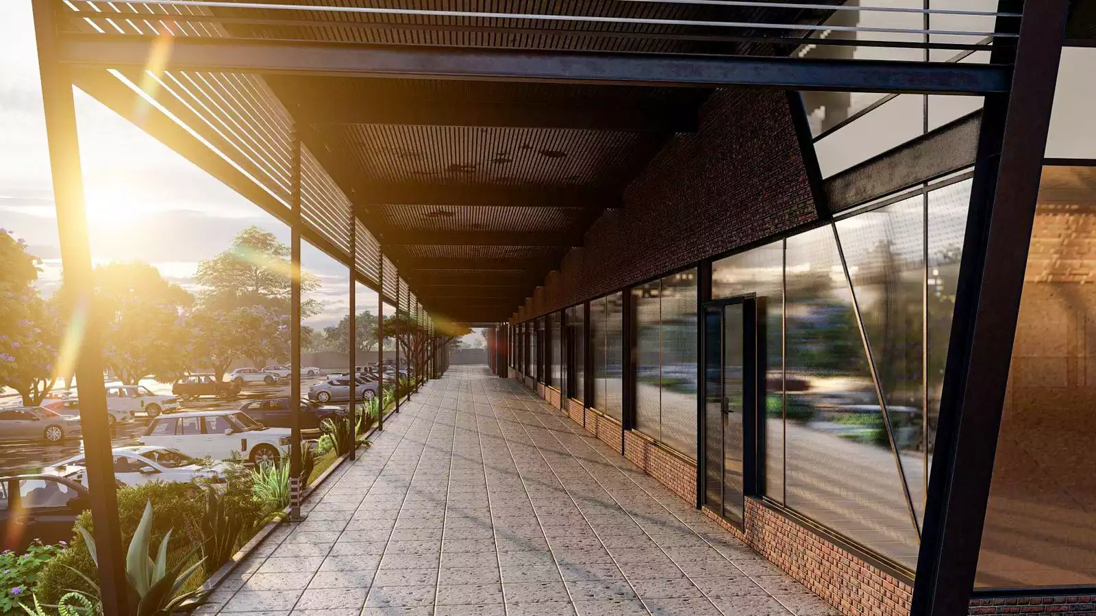 Steel and glass walkway detail in modern shopping centre design in Lusaka by Pantic Architects