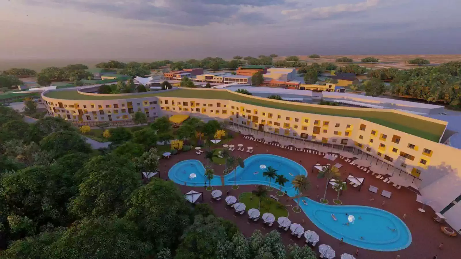 200 room luxury hotel with green roof and sprawling pool deck within vegetation