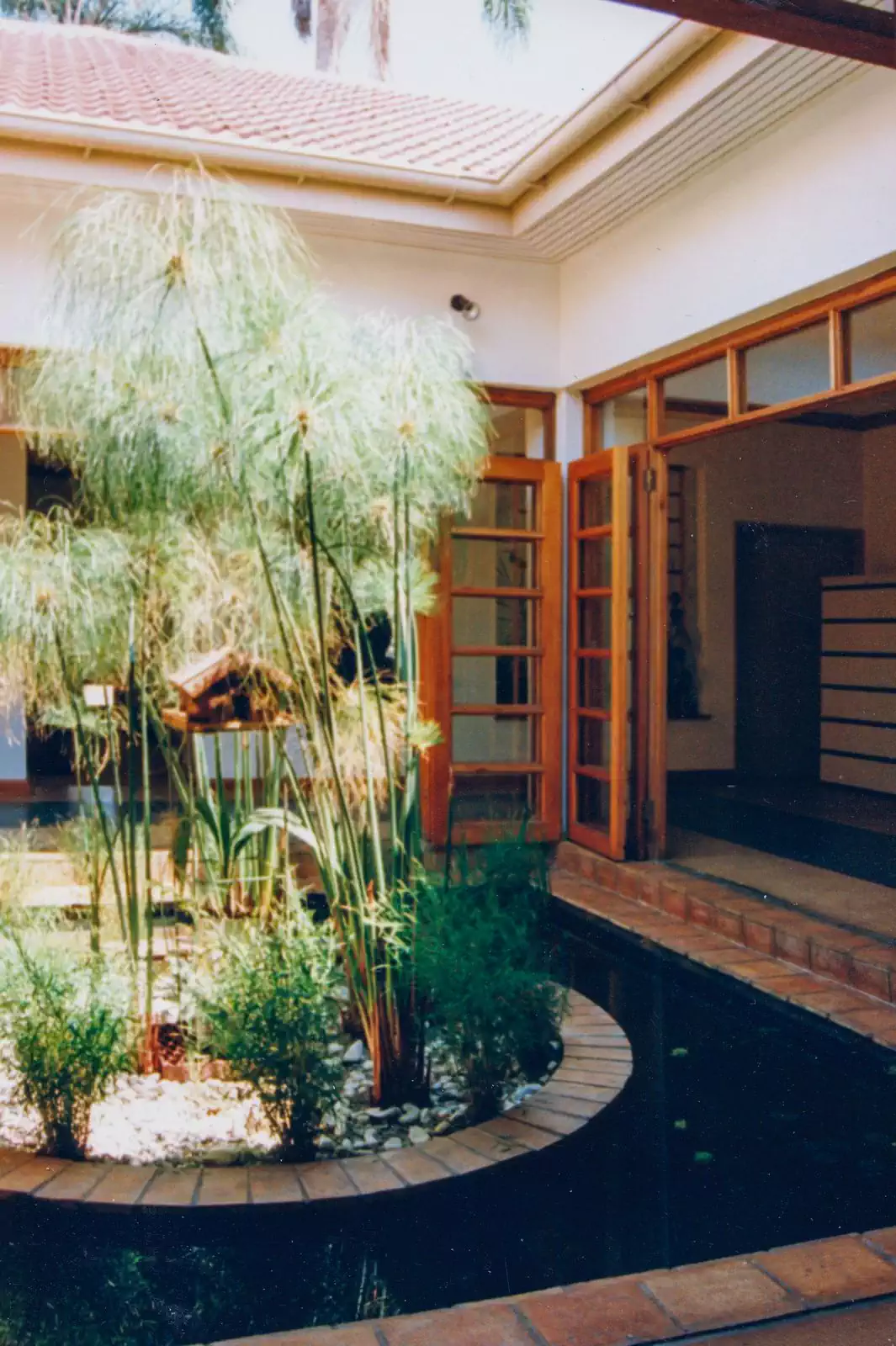 Atrium inside building with fountain. Modern interior design of Diagnostic imaging centre in Harare
