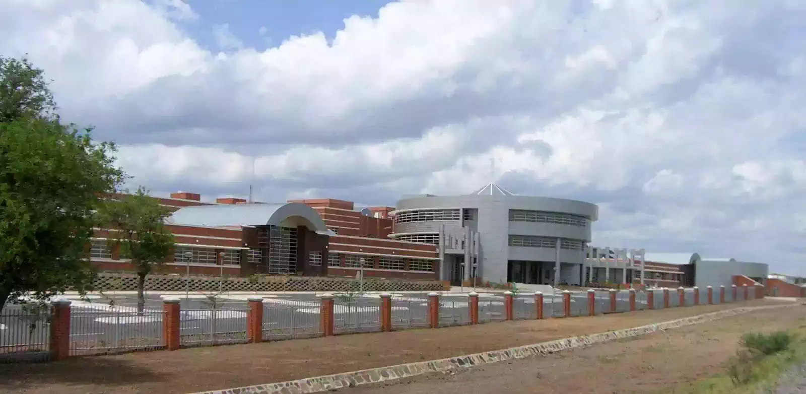 Modern large hospital complex with multiple buildings in Sekgoma