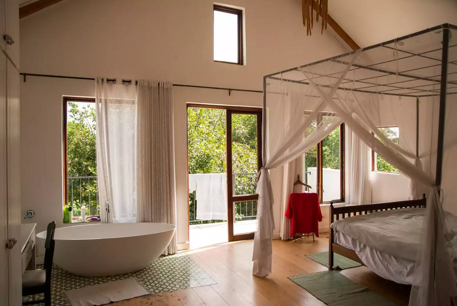 Bedroom with balcony in cape dutch house design in Harare