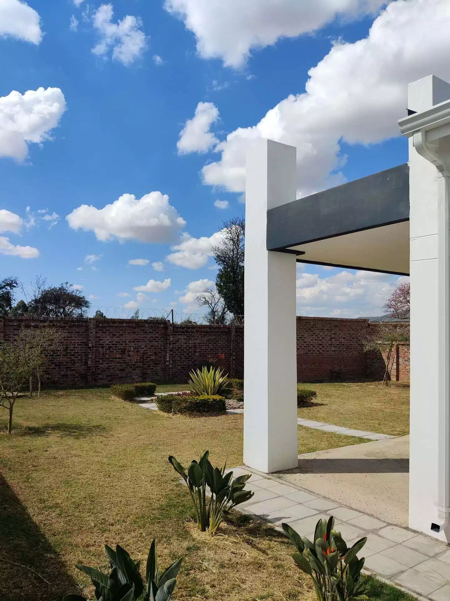 Back view of modern house in cluster complex in South Harare
