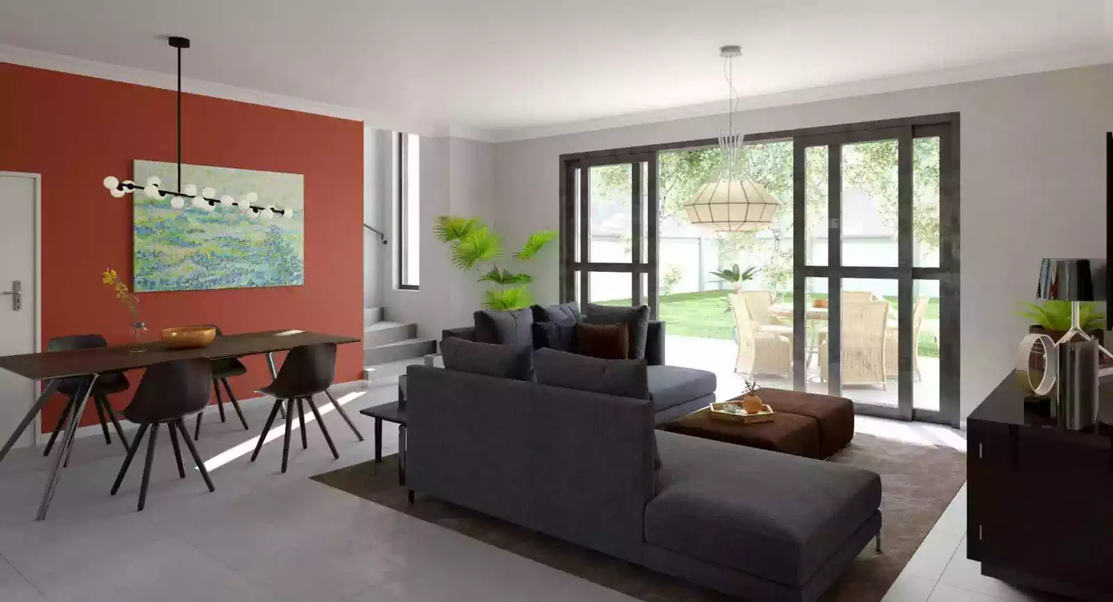 Modern open plan living and dining room of townhouse. Luxurious feel and staircase leading upstairs. Terracotta coloured wall with grey furniture. Large opening to veranda and back garden