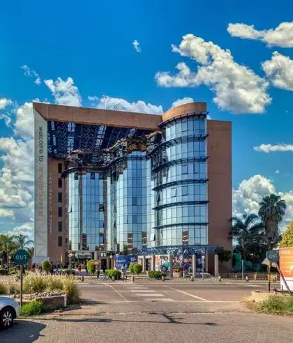 Modern bank building design with glass and steel by Pantic Architects