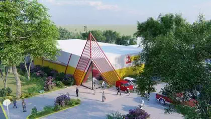 Distinctive Electrosales branded warehouse shop with metal red structure designed by Harare architect