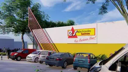 Distinctive Electrosales branded warehouse shop with metal red structure designed by Harare architect