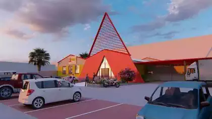 Distinctive Electrosales branded warehouse shop with metal red structure designed by Harare architect