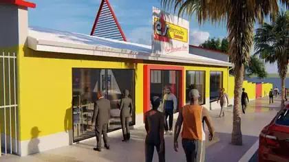 Distinctive Electrosales branded warehouse shop with metal red structure designed by Harare architect