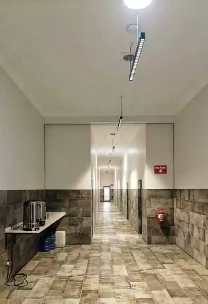 Front view of central office buildings showing decorative canopies as part of green design