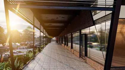 Steel and glass walkway detail in modern shopping centre design in Lusaka by Pantic Architects