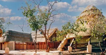Large thatched roof lodge main building by local architect