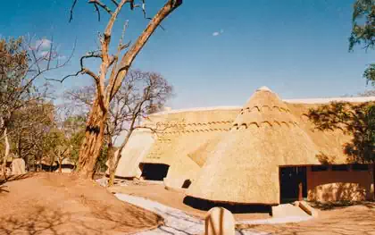 Large thatched roof lodge main building by local architect