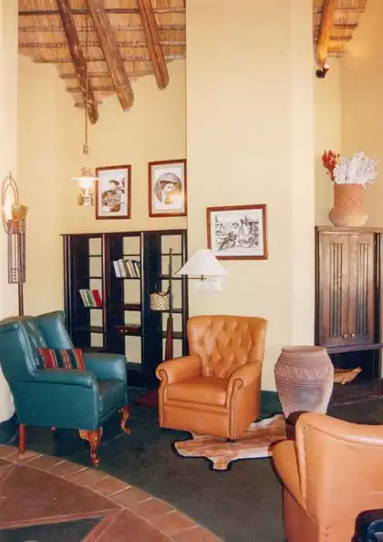Colonial interior design and vintage furniture in lodge interior by local architect