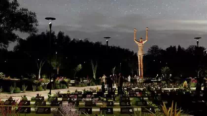 Night view of statue to Mohamad Ali in Greatest memorial park tribute. Design by Zimbabwe architects Pantic architects