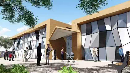 People in front of designed architectural entrance to indian cultural centre fragmented glass