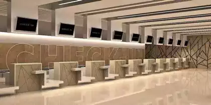 Check-in counters with geometric designs and lettering behind in Maun International Airport refurbishment project