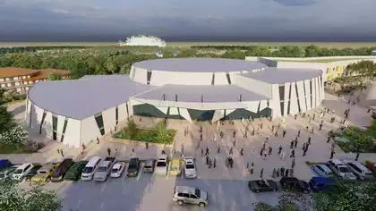 Circular waterfall inspired modern conference building with glass grooves, people and cars in foreground, waterfalls in background