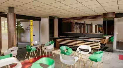 Modern interior design with wooden cladding and brightly coloured chairs by architect in Harare