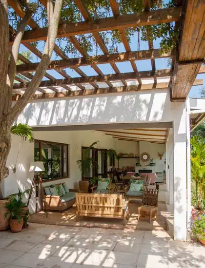 Large covered veranda on caoe dutch house design in Harare