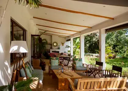 Large covered veranda on caoe dutch house design in Harare by harare architect