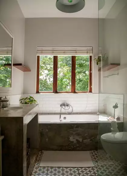 Polished screed finish in bathroom of interior house design by zimbabwean architect