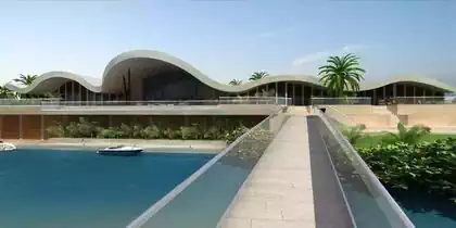 Intimate bridge to private beach island in front of wave beach palace in UAE. Design by architect in Harare.