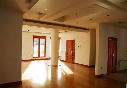 Interior of residential apartment building with wooden window frames