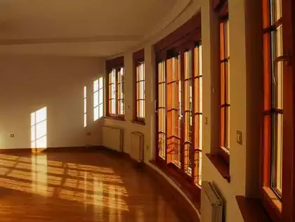 Interior of residential apartment building with wooden window frames