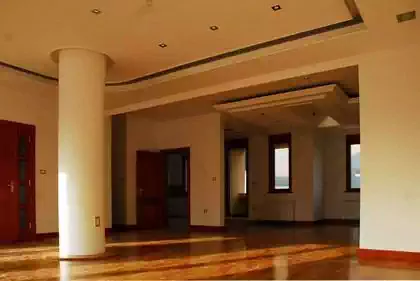 Interior of residential apartment building with wooden window frames