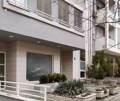 Entrance and ground floor to multi-story residential apartment building. design by Pantic architects