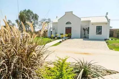 Cape dutch cluster homes in homely development in Zimbabwe. House design by Harare based architectural designers