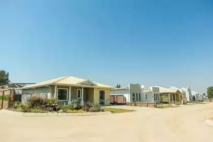 Various house types arranged along street in housing complex