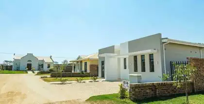 Modern minimalist house in Sunbird cluster house development in Arlington Harare. Simple elegant house design by Harare architect