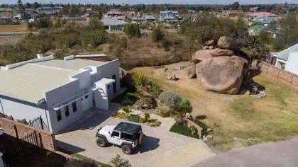 Side with of cantilevered entrance canopy to contemporary home by design architect