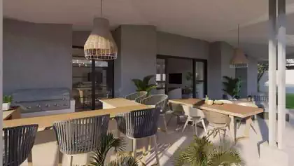 Close-up view of eatery and dining table on spacious veranda of luxury modern villa in residential complex