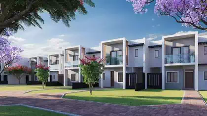 Modern double story townhouse flat with louvres and glass balcony in Victoria Falls by Harare architect
