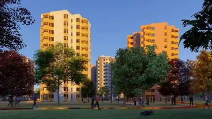 Park and people jogging with apartment buildings in background in revitalized area of central Harare